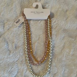 Ann Taylor Factory beaded necklace. Gold tone findings, 18”, peach, pink, pearl